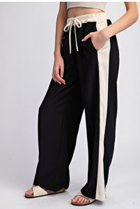 PANTALON NEGRO CINTA BEIGE