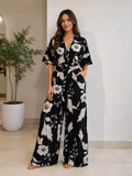 Jumpsuit Negro Floral con Escote en V y Pierna Ancha