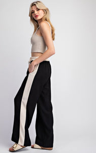 PANTALON NEGRO CINTA BEIGE