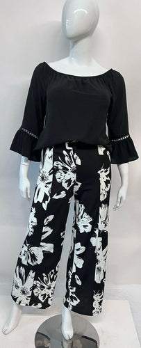 PANTALON FRIDA NEGRO FLOR BLANCA